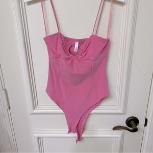 NWOT Glam Pink Bodysuit S